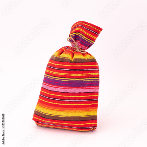 Colourful handmade traditional coffee bag in isolated white background