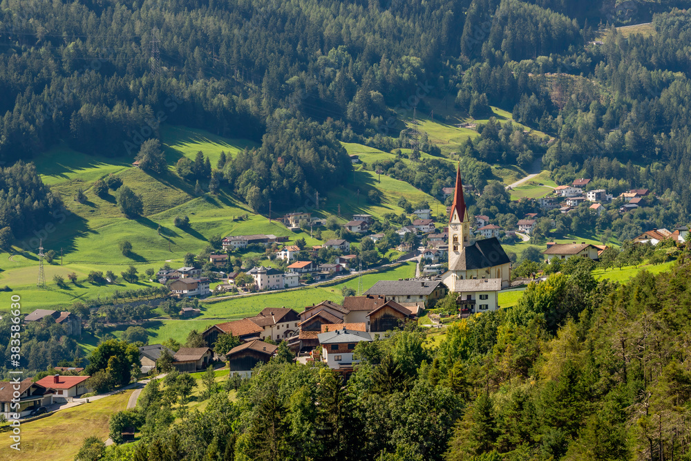 Beautiful aerial view of the village of Stanz bei Landeck, Tyrol, Austria, on a sunny day