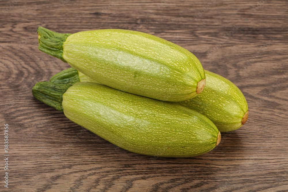 Young tasty zucchini over board Young tasty zucchini over board