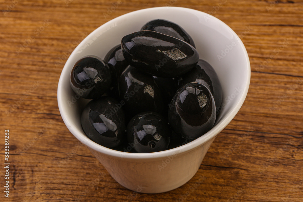 Pickled black olives in the bowl Pickled black olives in the bowl