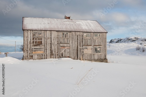 Boarded up house in Fredvang Moskensoy Loftofen Norway photo