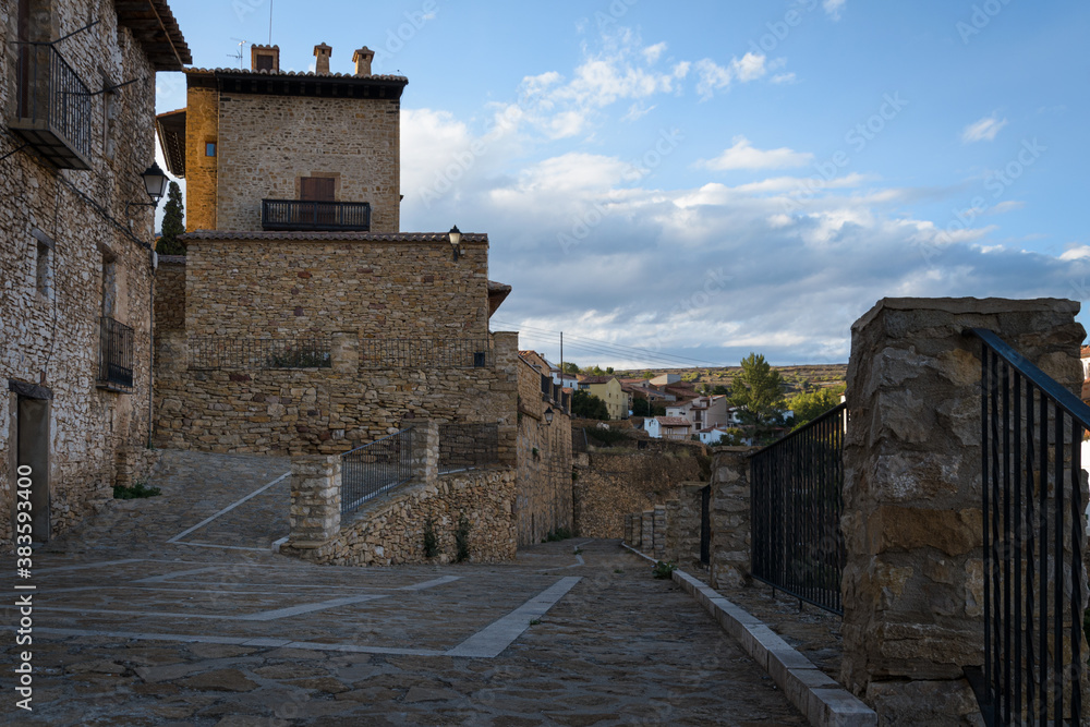 Streets of the medieval village of La Iglesuela del Cid at sunset, Teruel, Spain