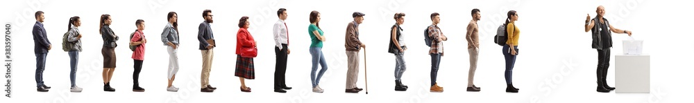 Full length portrait of a punk man voting and showing a thumb up and a line of people waiting Full length portrait of a punk man voting and showing a thumb up and a line of people waiting