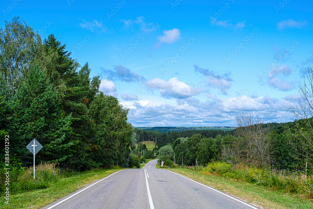Fototapeta premium Landscape with the image of a country road