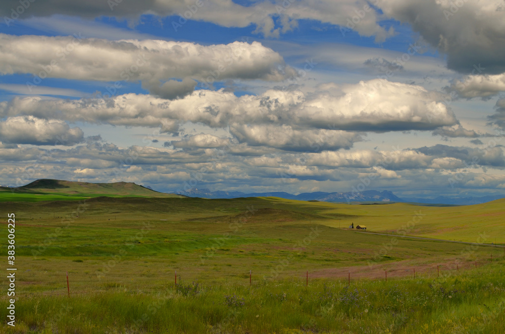 Montana - Little Farm on the Prairie under the Clouds by Highwwy 89 to Browning
