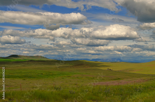 Montana - Little Farm on the Prairie under the Clouds by Highwwy 89 to Browning