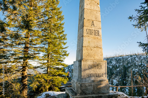 Stone monument of Adalbert Stifter at the Plöckenstein (Plechy) mountain above Plesne Lake in the Bohemian Forest, Sumava national park, Nova Pec, Czech Republic photo