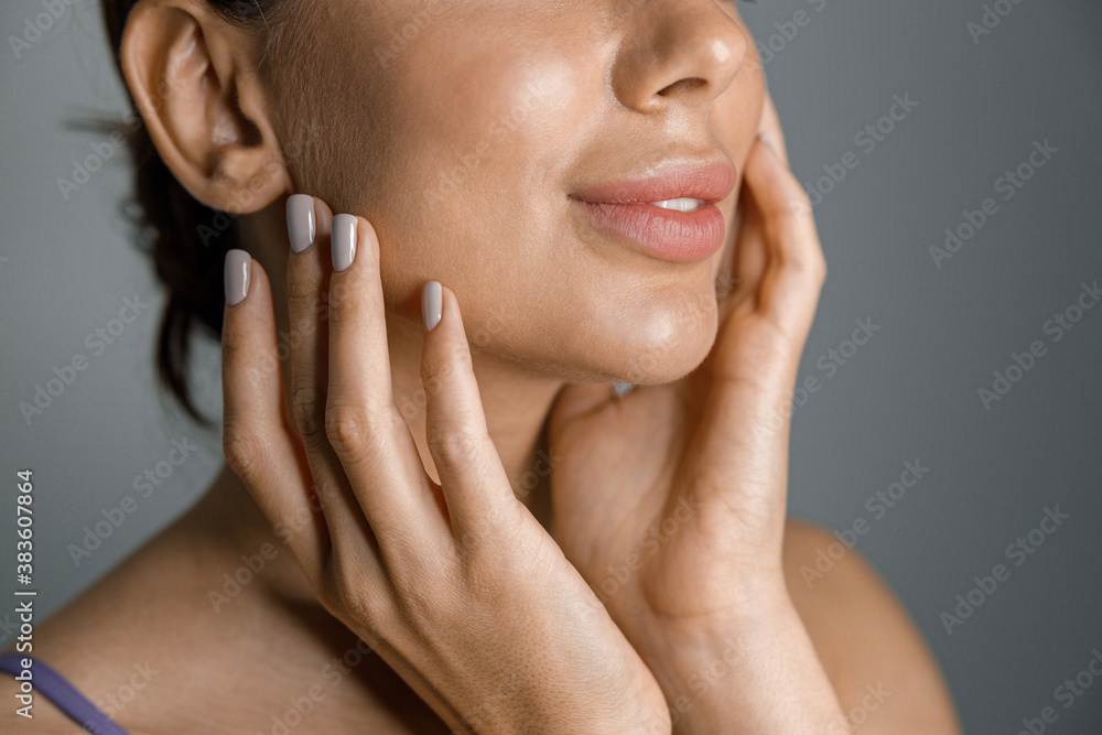 Beautiful healthy smiling caucasian woman is doing beauty procedures at spa and healthcare salon