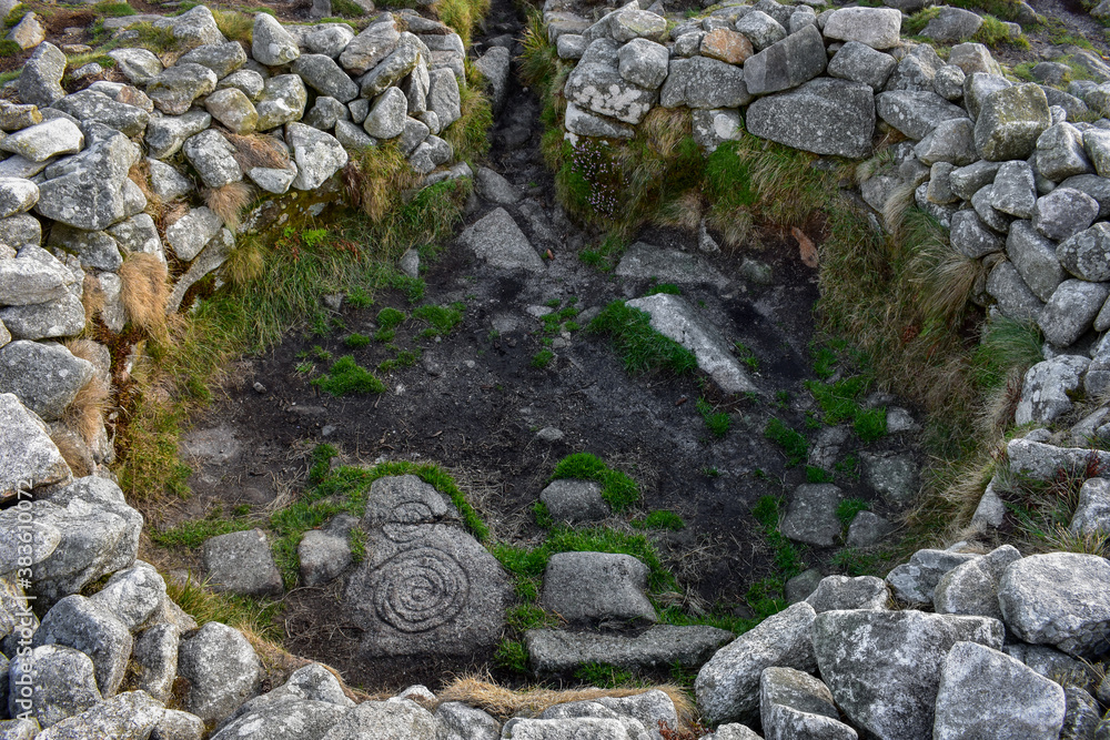 Ancient Spiral Stone Carving at Celtic Passage Tomb, Ireland