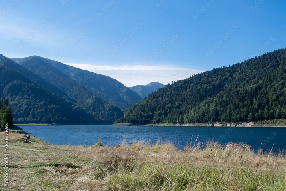 Gura apelor mountain lake and hills in Romania landscape