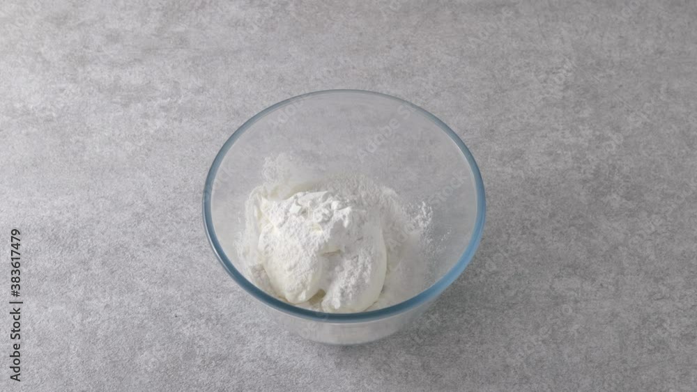The cook adds sugar to the bowl
The cook adds sugar to the bowl