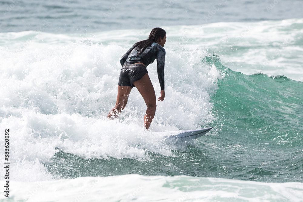 Male man catching waves 