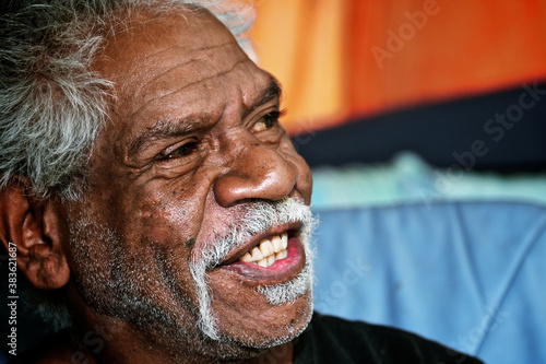 Portrait of mature man smiling at home photo