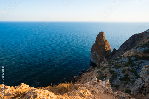 Summer seascape with Fiolent rocks formation on the coast of Sevastopol. view on cape in the sea, clear azure water