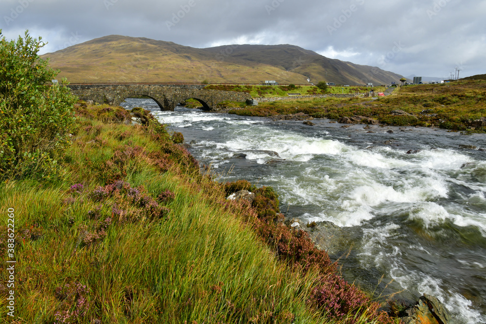Island Skye,  river in the mountains and old bridge
