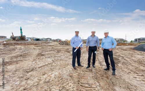 A group of property developers doing a site inspection