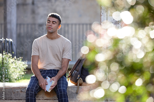 Young Indigenous Australian man enjoying time outdoors photo