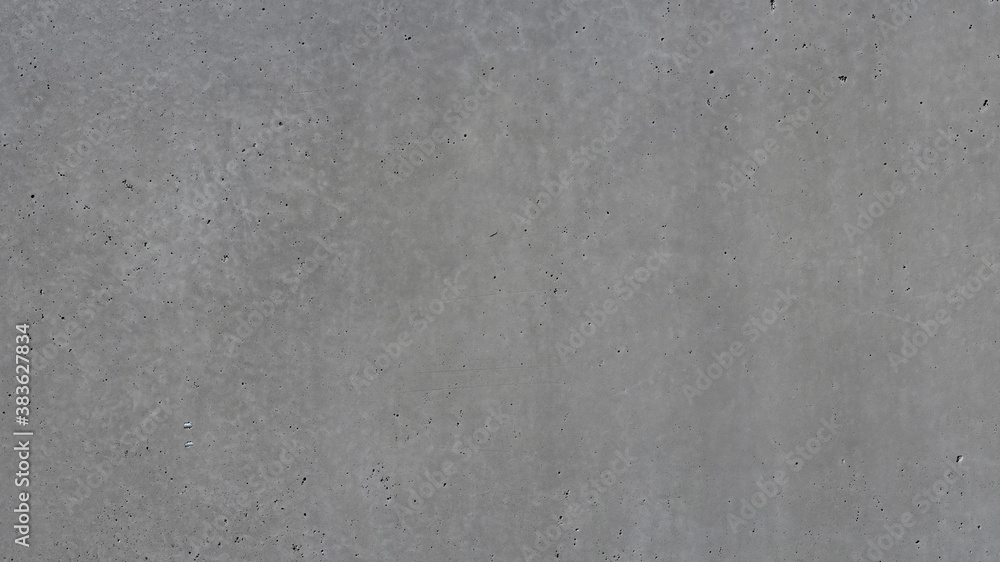 Texture of a dark gray concrete or cement wall