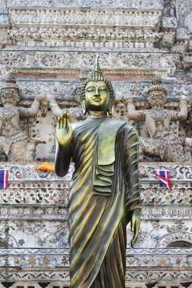 A bronze Buddha statue at a temple in Bangkok.