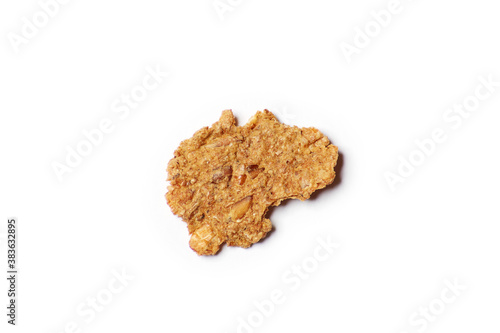 One alone cloxe-up macro dietic fitness corn flake isolated on the white background