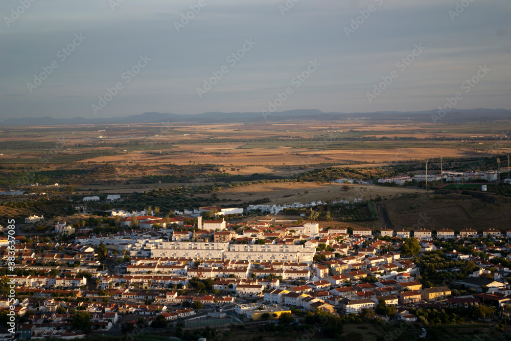 The onset of dusk. Sunset over the village. Urban village from above