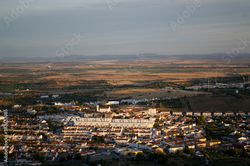 The onset of dusk. Sunset over the village. Urban village from above