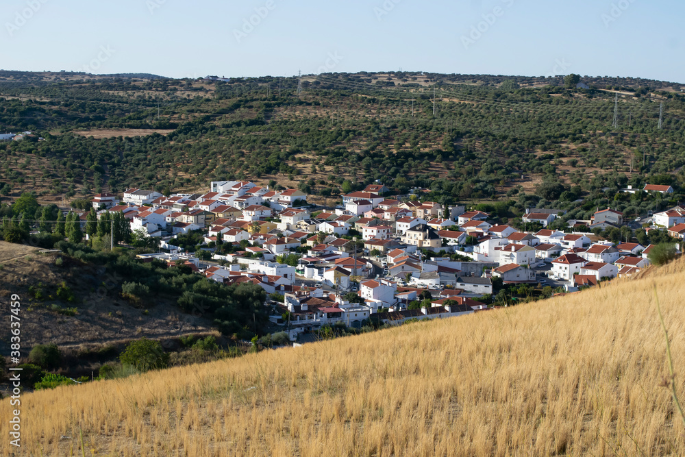 A small village at the bottom of the valley. View from above