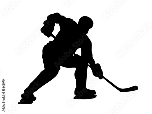 Isolated Silhouette.Ice hockey player in full equipment while playing ice hockey. 