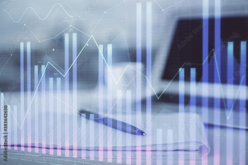 Double exposure of financial graph drawings and desk with open notebook background. Concept of forex market Double exposure of financial graph drawings and desk with open notebook background. Concept of forex market