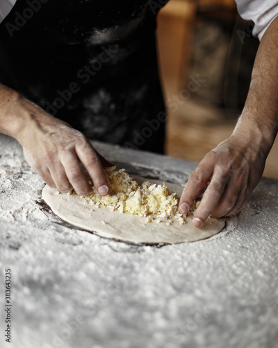 the process of cooking traditional Caucasian dishes. khinkali khachapuri.