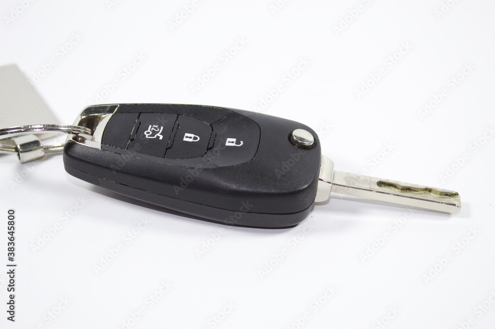 Chave de um carro com fundo branco Chave de um carro com fundo branco