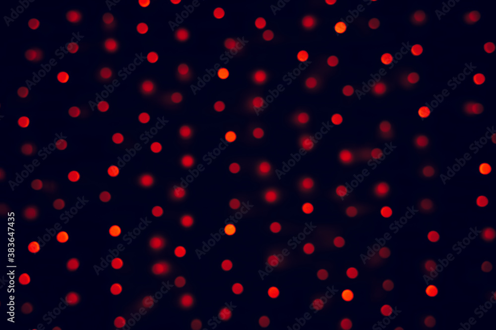 red garland lighting bokeh unfocused effect holidays decoration on black background space concept simple wallpaper picture