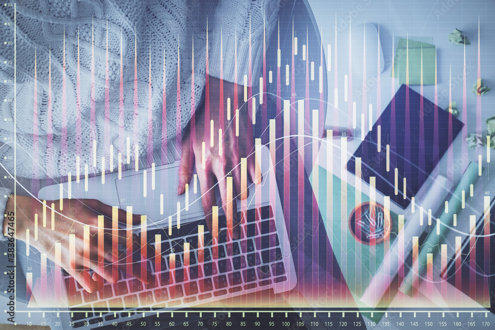 Multi exposure of woman hands working on computer and forex chart hologram drawing. Top View. Financial analysis concept. Multi exposure of woman hands working on computer and forex chart hologram drawing. Top View. Financial analysis concept.