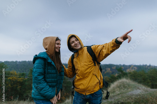 young man and woman traveling together
