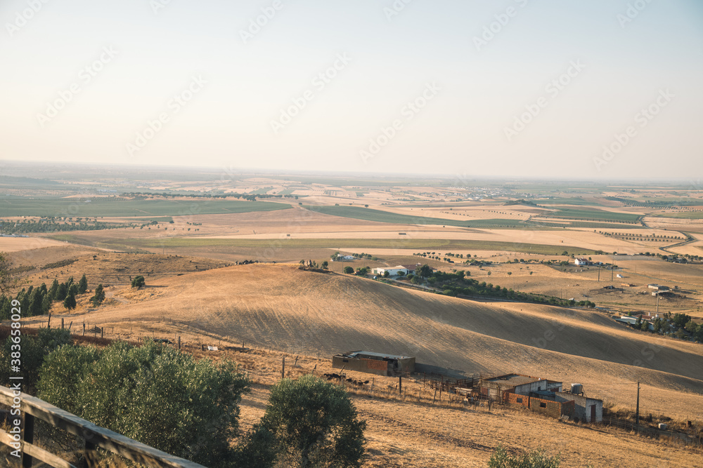 Obraz premium steppe landscape with the image of wide fields and the city. Mountain landscape in Portugal