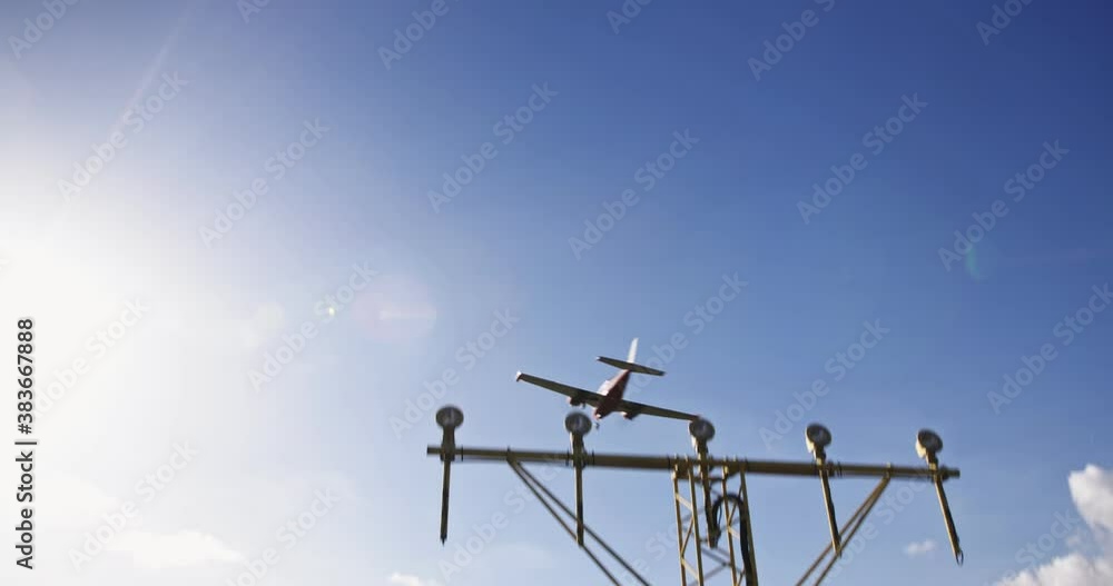 An airplane landing at Rotterdam The Hague Airport, The Netherlands An airplane landing at Rotterdam The Hague Airport, The Netherlands