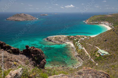 The beautiful blue and green coast of a tropical island from a high viewpoint.