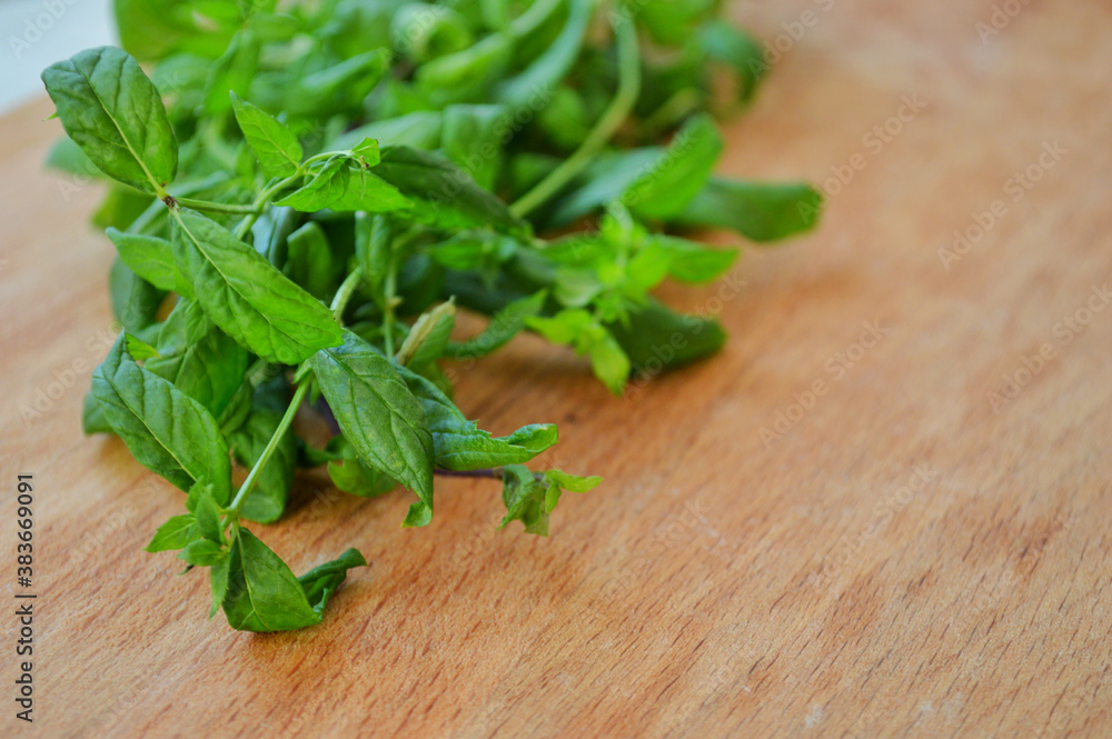 Bunch of fresh mint on wooden background Bunch of fresh mint on wooden background