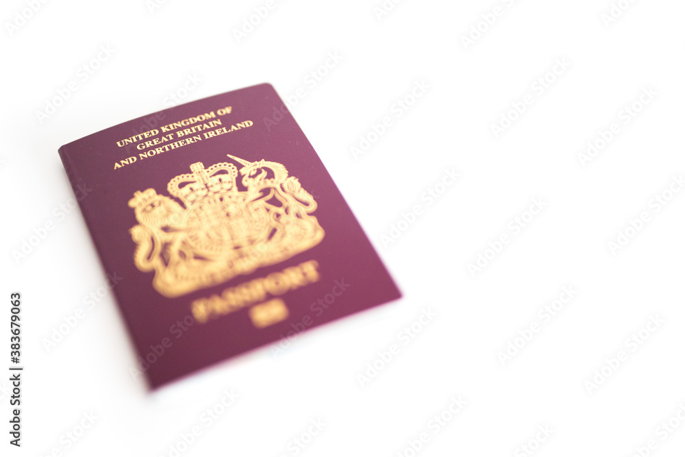 New UK British United Kingdom Passport flatlay against white blank background with copy space