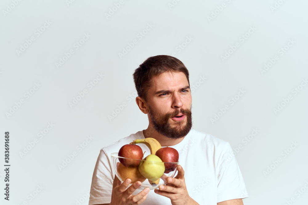man with fresh fruit in a glass cup gesturing with hands vitamins health energy model bushy beard mustache man with fresh fruit in a glass cup gesturing with hands vitamins health energy model bushy beard mustache