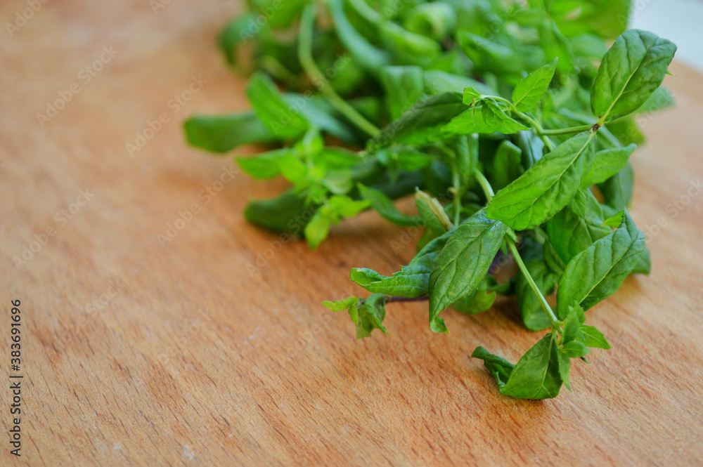 Bunch of fresh mint on wooden background Bunch of fresh mint on wooden background
