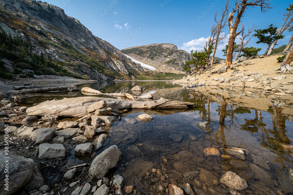 St Marys Lake and glacier in Colorado, wide angle view on a sunny day, view of bristlecone pine trees