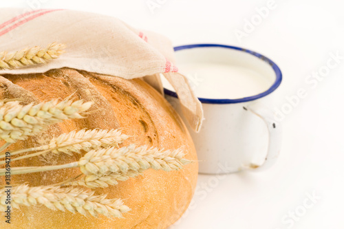 Fresh bread and milk photo