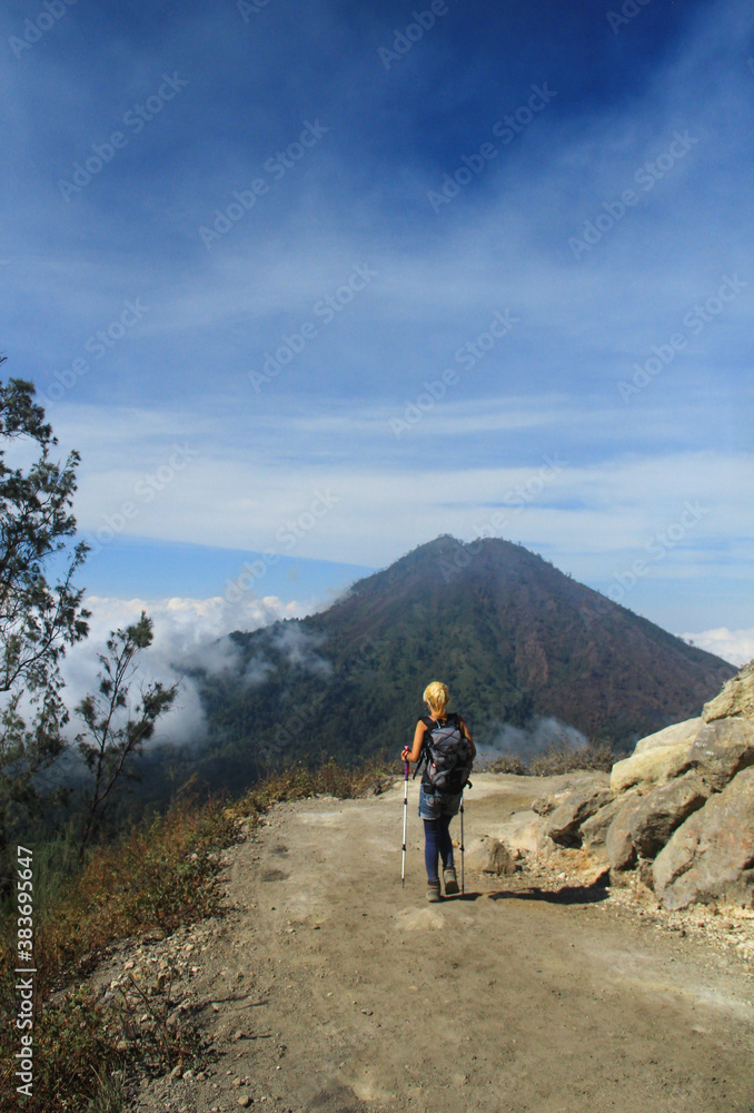 A woman on the way back from Mount Ijen Banyuwangi East Java Indonesia