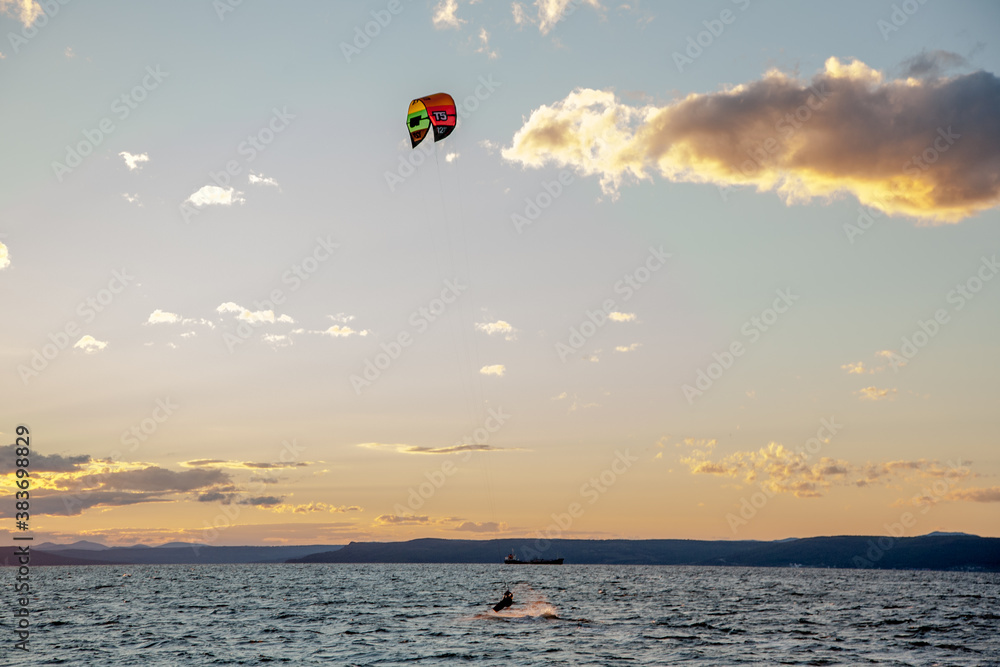 Vladivostok, Primorsky Krai/ Russia-September 28th, 2015: Skydiving during the sunset on Vladivostok seaside Vladivostok, Primorsky Krai/ Russia-September 28th, 2015: Skydiving during the sunset on Vladivostok seaside