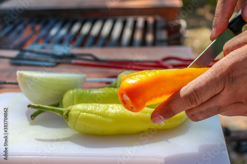 Cooking peppers and onions photo