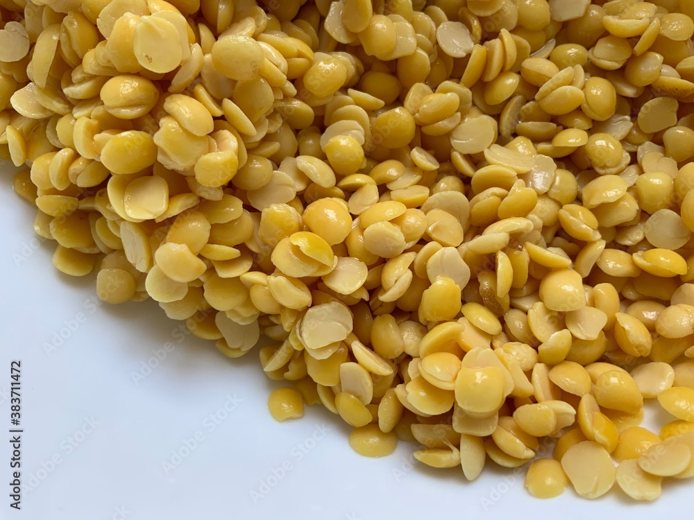 Flat lay of Split pigeon peas on an isolated white background Flat lay of Split pigeon peas on an isolated white background