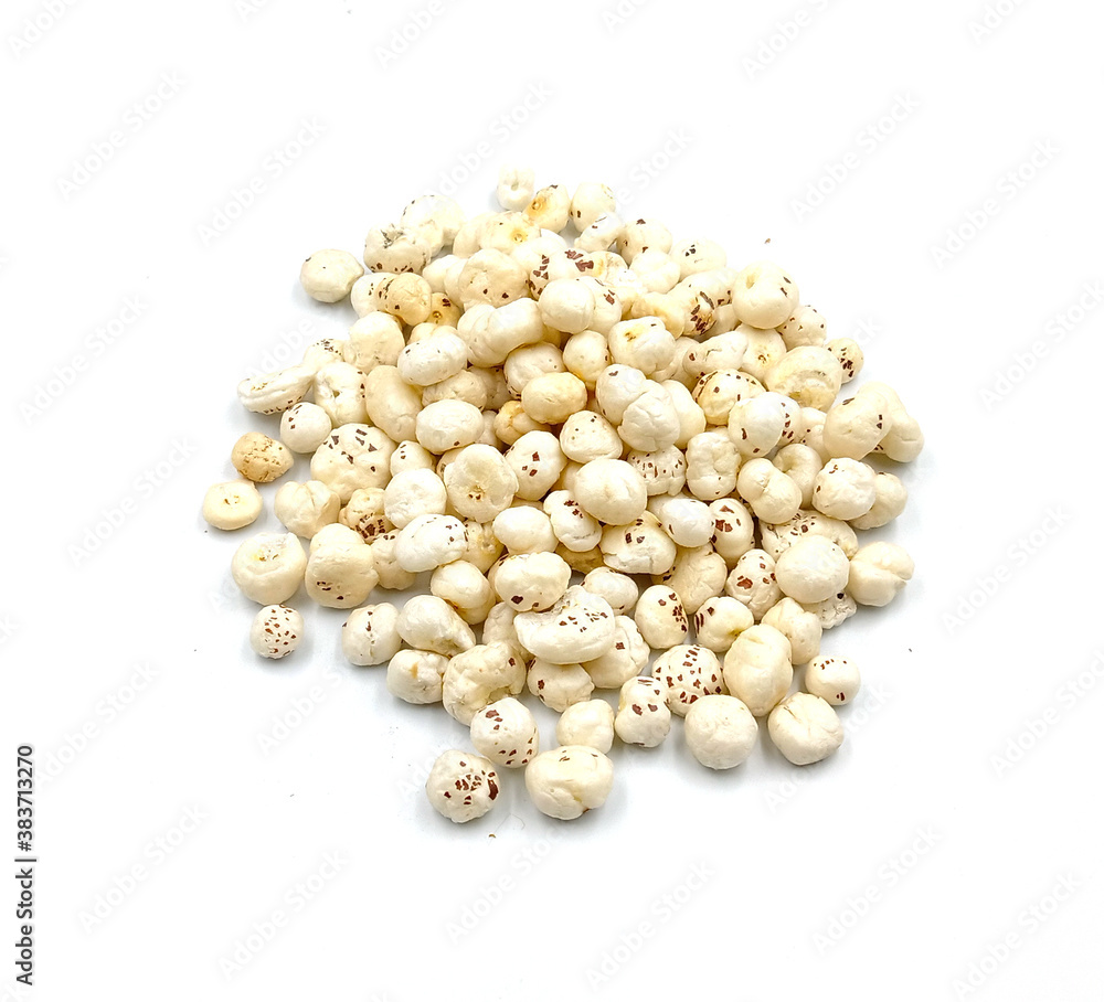 Crispy Lotus pops Seeds or Phool Makhana served in a glass bowl Crispy Lotus pops Seeds or Phool Makhana served in a glass bowl