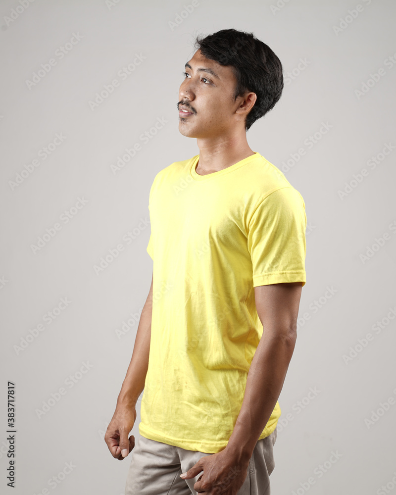 Young men in empty T-shirts and wearing health masks, dress up and pose like famous T-shirt models. Men's t-shirt template and mockup design for print. Young men in empty T-shirts and wearing health masks, dress up and pose like famous T-shirt models. Men's t-shirt template and mockup design for print.
