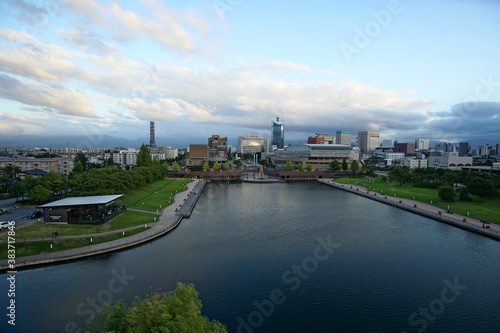 Beautiful Japanese garden with a pond and trees, leaves, nature landscape in Toyama castle, Japan